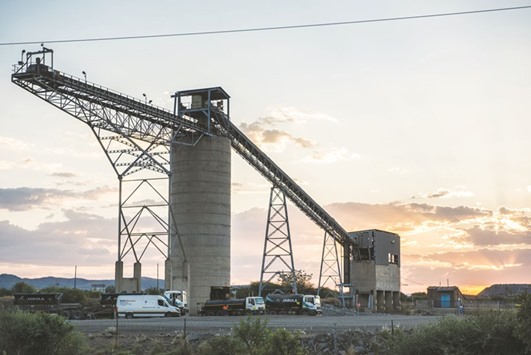 Vehicles sit parked by the Marikana platinum mine, operated by Lonmin, in South Africa. Investors are losing confidence in the worldu2019s third-largest platinum producer as it burns through cash to stay afloat, just 15 months after raising about $400mn from shareholders.