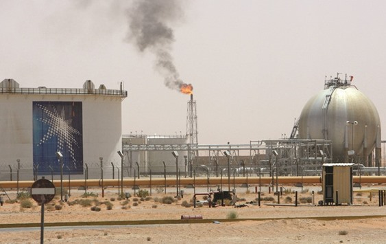 A gas flame is seen in the desert near the Khurais oilfield, Saudi Arabia (file). While the kingdom pumped more than 10mn bpd last month, the volume of crude supplied to markets nonetheless fell by 90,000 bpd to 9.9mn. The nationu2019s data show itu2019s cutting output more than required under the terms of Opecu2019s November 30 agreement.