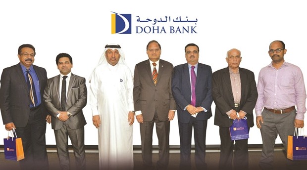 Doha Bank officials and other dignitaries during the recently-held meeting with SME owners.