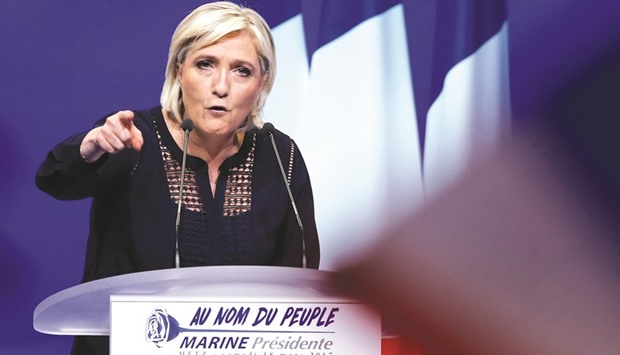 Marine Le Pen, French National Front (FN) political party leader and candidate for French 2017 presidential election, addresses supporters during a political rally in Metz, France, on Saturday.