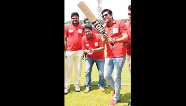 Cricketer-turned Trinamool Congress leader and West Bengal minister Laxmi Ratan Sukla and film stars play cricket to help raise funds for underprivileged children at Eden Garden in Kolkata yesterday.