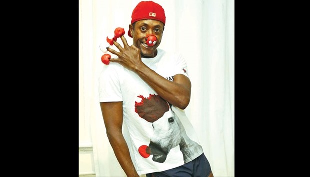 Kinky Boots star Matt Henry poses for Comic Relief. The cast of the musical will be doing bucket collections and auctioning off a billboard sign on March 24.