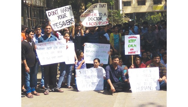 Doctors stage a silent protest outside the Sion hospital in Mumbai yesterday.