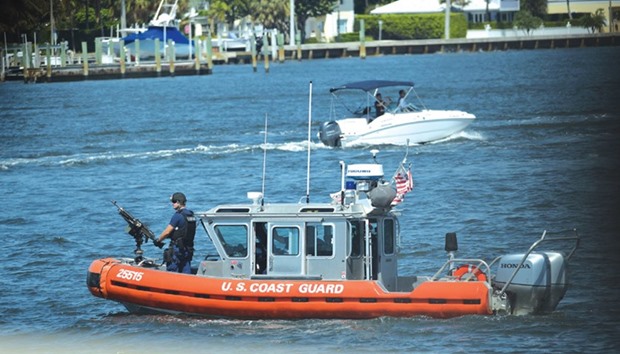 A Coast Guard vessel patrols Lake Worth Lagoon, near the Mar-a-Lago estate of US President Donald Trump on Palm Beach, Florida.