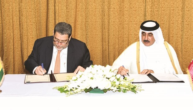HE Jassim Seif Ahmed al-Sulaiti and Ralph Gonsalves signed an agreement on aerial transport co-operation in Doha yesterday.