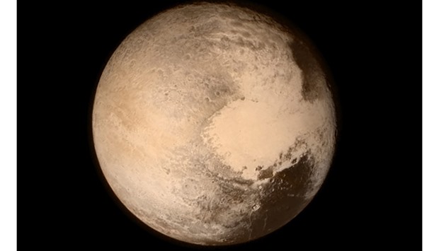 Pluto nearly fills the frame in this image from the Long Range Reconnaissance Imager (LORRI) aboard NASA's New Horizons spacecraft taken on July 13, 2015 when the spacecraft was 768,000 kilometers from the surface.