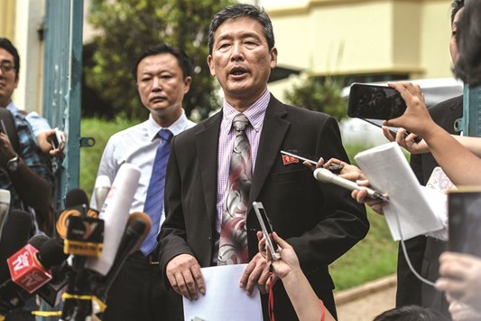 Former North Korean deputy ambassador to the United Nations Ri Tong-il addresses journalists outside the North Korean embassy in Kuala Lumpur.