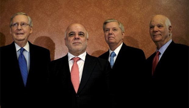 US Senate Majority Leader Mitch McConnell (left), Senator Lindsey Graham, (centre), and Senator Ben Cardin meet Iraqi Prime Minister Haider al-Abadi on Capitol Hill in Washington on Tuesday.