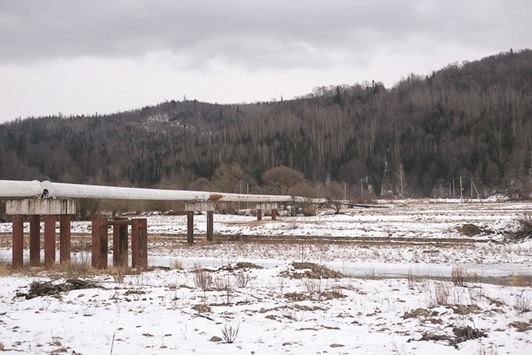 A section of the Bratstvo gas pipeline crosses a river near Ivano-Frankvisk, Ukraine as seen in this photo dated February 6, 2014. Ukraine is a key route for Russiau2019s energy exports to Europe. Gazprom, Russiau2019s state-run export monopoly, shipped a record amount of gas to the European Union last year and accounts for about 34% of the trading blocu2019s use of the fuel. Russia will remain the biggest source of supply through 2035, Shell said last week, echoing comments by BP in January.