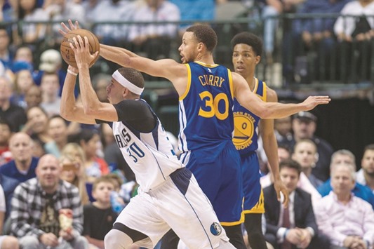 Dallas Mavericks guard Seth Curry drives to the basket against Golden State Warriors guard Stephen Curry during the second half at the American Airlines Centre. The Warriors defeat the Mavericks 112-87. PICTURE: USA TODAY Sports