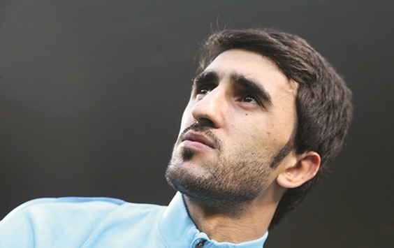Qatar midfielder Ali Asad.