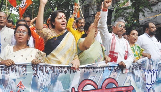 West Bengal BJP leaders stage a demonstration against the Trinamool Congress government in Kolkata yesterday.
