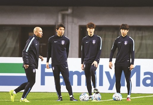 South Korean players train during a practice session ahead of a World Cup football qualifying match against China in Changsha, Chinau2019s central Hunan province, yesterday.