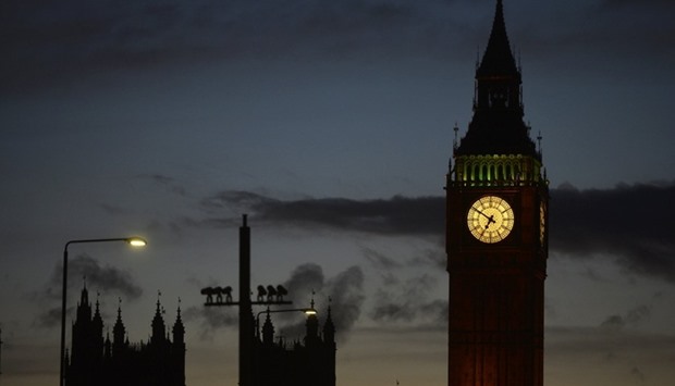 The sun sets behind the Houses of Parliament after an attack on Westminster Bridge in London.