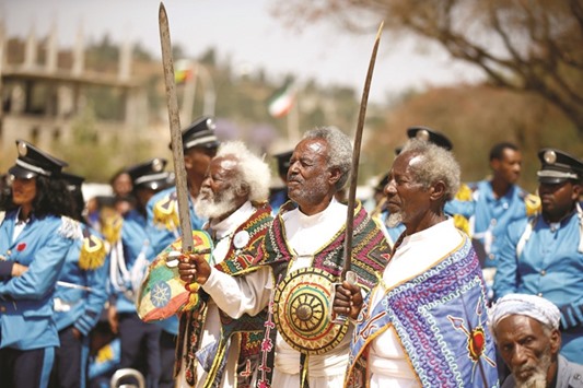 Ethiopian military veterans pose with their swords and bucklers.