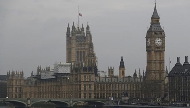 The union flag over the Houses of Parliament flies at half-mast the morning after an attack in London, on Thursday.