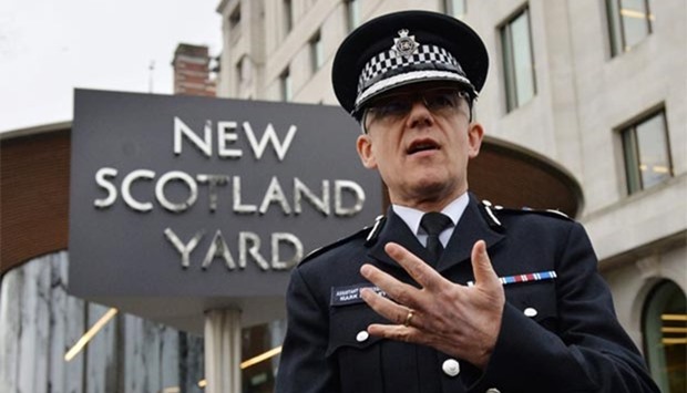 The British Metropolitan Police\'s Acting Deputy Commissioner, and Head of Counter Terrorism, Mark Rowley, addresses the media outside New Scotland Yard in central London on Thursday.