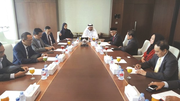 Indonesian deputy speaker of the House of Representatives, Dr Agus Hermanto, and the accompanying delegation meets with al-Sayed and Ooredoo public relations director, Fatima al-Kuwari.