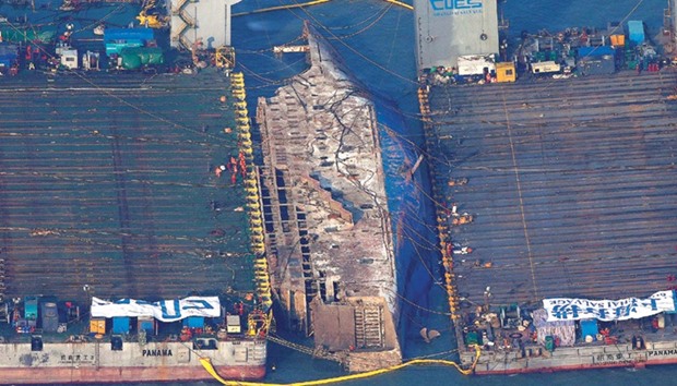 The sunken ferry Sewol is seen during its salvage operations at the sea off Jindo, South Korea.