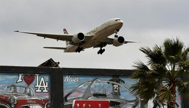 An Etihad Airlines plane from Abu Dhabi prepares to land at Los Angeles International Airport this week. From toothpaste to pocket knives, ink cartridges and scissors, the US cabin ban on electronic devices on flights from the Middle East and North Africa adds to a long list of products already blacklisted on international flights.
