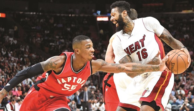 Toronto Raptors guard Delon Wright (No 55) steals the ball away from Miami Heat forward James Johnson during the second half at American Airlines Arena. The Raptors won 101-84. PICTURE: USA TODAY Sports