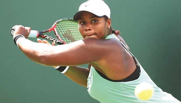 Taylor Townsend returns a shot against Roberta Vinci of Italy during the Miami Open at Crandon Park Tennis Centre in Key Biscayne, Florida. (Getty Images/AFP)
