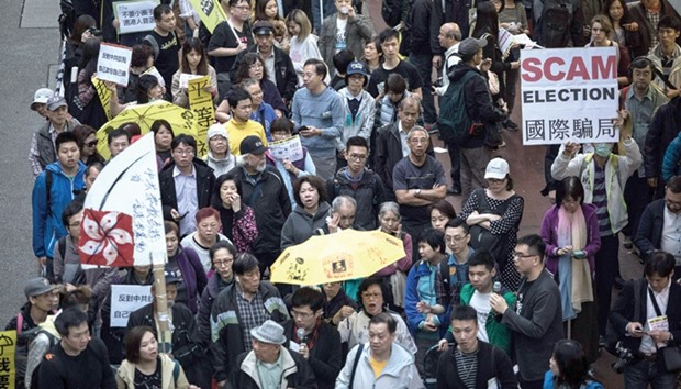 Activists take part in a pro-democracy rally in Hong Kong yesterday.