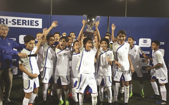 Aspire Academy under-13 team celebrate after winning the Tri-Series tournament.