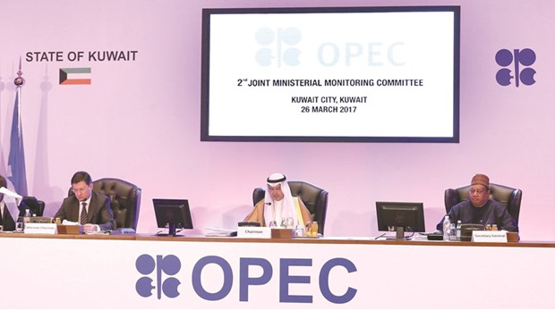 From left:  Russian Energy Minister Alexander Novak, Kuwaitu2019s Oil Minister Essam al-Marzouq and Opec secretary general Mohammad Sanusi Barkindo attend a meeting of the 2nd Joint Ministerial Monitoring Committee of Opec in Kuwait City yesterday. Opec and 11 other leading producers including Russia had agreed in December to cut their combined output by almost 1.8mn bpd in the first half of the year.
