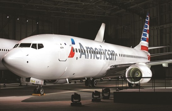 An American Airlines jet is seen at DFW Airport in Fort Worth, Texas. The worldu2019s largest carrier is in talks to acquire a stake in China Southern Airlines, according to a statement by Asiau2019s biggest carrier by passengers.