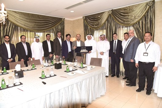 Goic and Saudi Aramco officials during a partnership meeting on industrial development.