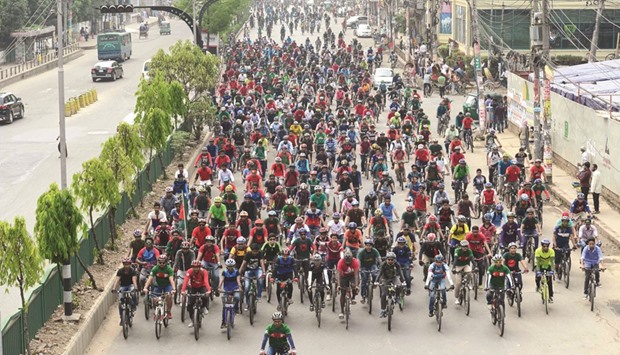 Members of the BDCyclists group participate in a bicycle rally to mark the countryu2019s independence day in Dhaka yesterday.