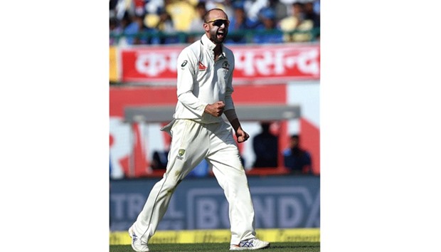 Australiau2019s Nathan Lyon celebrates the wicket of Indiau2019s Ajinkya Rahane during the second day of the fourth and last Test at The Himachal Pradesh Cricket Association Stadium in Dharamsala yesterday. (AFP)