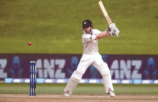 Kane Williamson of New Zealand cuts en route to his unbeaten hundred during the third Test against South Africa at Seddon Park in Hamilton yesterday. (AFP)