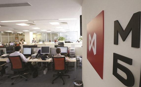 Employees work on the floor of the Moscow Exchange. Russiau2019s biggest exchange operator offered companies direct access to its foreign-currency market two months ago. But it has yet to lure any takers.