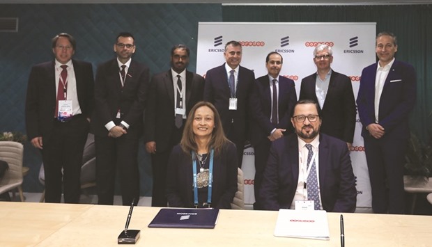 Ooredoo Group Deputy CEO Waleed al-Sayed and Rafiah Ibrahim, head of Ericsson Region Middle East and East Africa, with other officials during the agreement signing ceremony.