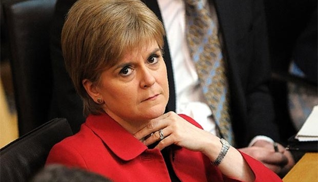 Scotland's First Minister Nicola Sturgeon listens in the chamber on the second day of the 'Scotland's Choice' debate in Edinburgh, on Tuesday.