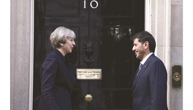 Britainu2019s Prime Minister Theresa May greets HE the Prime Minister and Minister of Interior Sheikh Abdullah bin Nasser bin Khalifa al-Thani at Downing Street in London on Monday. More than 400 Qatari officials and executives as well as bankers from the some of the worldu2019s top financial institutions were in the UK for the two-day investment forum.