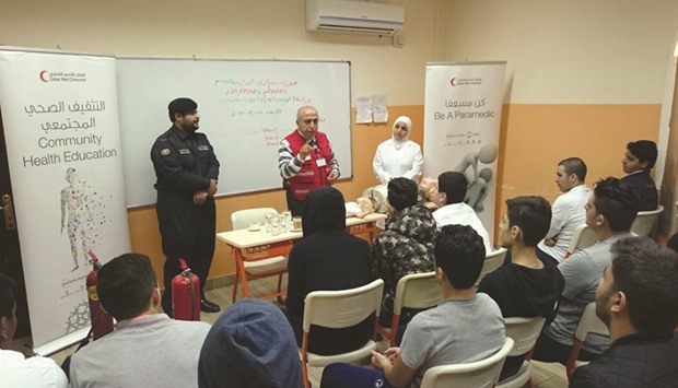 Lecturers discuss safety and security in fire emergencies to students.