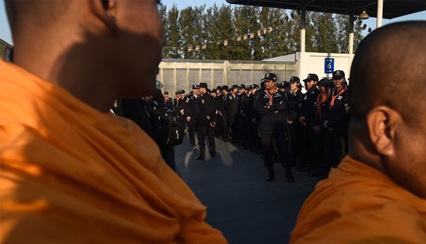 Buddhist monks with thai police