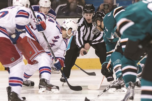 New York Rangers centre Oscar Lindberg (No 24) faces off against the San Jose Sharks in the second period at SAP Center at San Jose. PICTURE: USA TODAY Sports