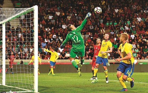 Swedenu2019s goalkeeper Karl-Johan Johnsson clears the ball during the friendly against Portugal at the Estadio dos Barreiros in Funchal, Portugal. (AFP)