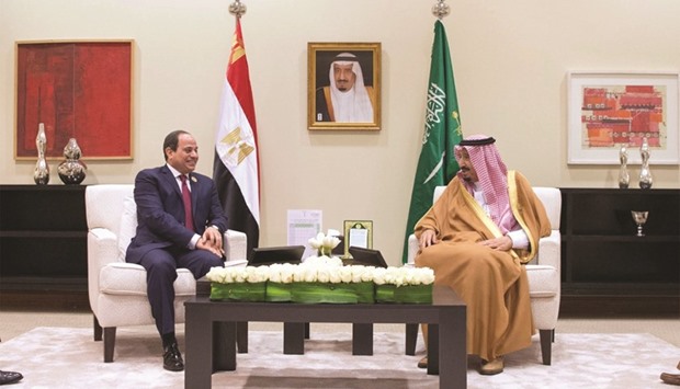 Saudi Arabiau2019s King Salman meets with Egyptu2019s President Abdel  Fattah al-Sisi on the sidelines of the 28th Ordinary Summit of the Arab League at the Dead Sea, Jordan,  yesterday.