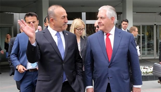 Turkey's Foreign Minister Mevlut Cavusoglu and US Secretary of State Rex Tillerson arrive for a meeting in Ankara on Thursday.