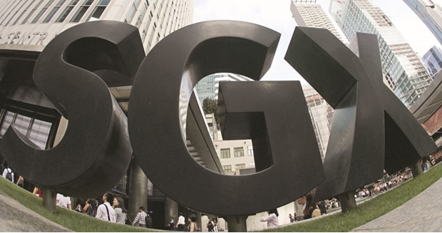 A view of the Singapore Exchange signage outside its office in Singapore. SGX, with a market value of about $6bn, has been weighing its options as rivals attempt to consolidate across the industry. An outright sale would be complicated as cross-border deals between exchange operators attract intense scrutiny from regulators, sources said.