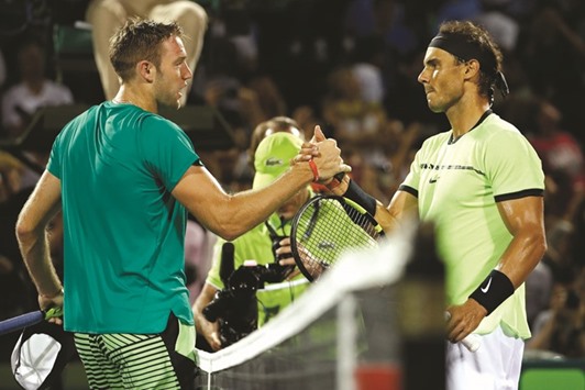 Rafael Nadal of Spain (R) shakes hands with Jack Sock of the United States (L) after their Miami Open quarterfinal at Crandon Park Tennis Centre. Nadal won 6-2, 6-3. PICTURE: USA TODAY Sports
