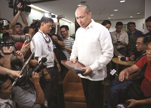 Opposition Filipino lawmaker Gary Alejano, a former military officer who joined an uprising against former president Gloria Arroyo in 2003, arrives to file his supplemental impeachment complaint against President Rodrigo Duterte at the Philippine Congress.