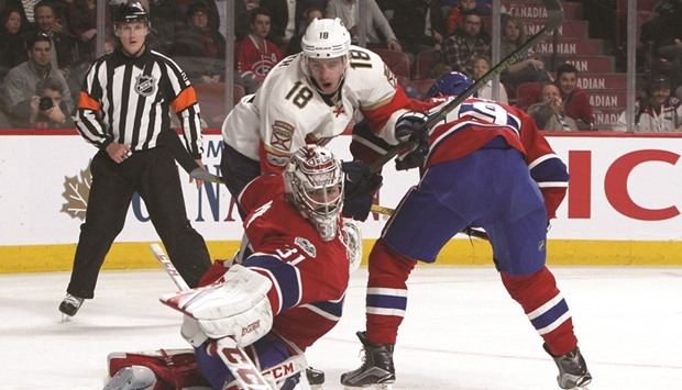 Montreal Canadiens goalie Carey Price (left) makes a save against Florida Panthers during the first period. (USA TODAY Sports)