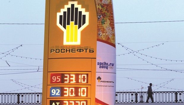 The company logo of Rosneft is seen outside a service station in Moscow. The Russian firm is set to take a 49% stake in Indiau2019s Essar Oil to pursue its global expansion.