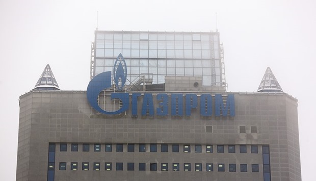 A logo is displayed above the headquarters of Gazprom in Moscow. The gas exporter is eyeing a chance this year for a new supply deal with China, which would be the first since a debut contract in 2014 before gas talks between the nations stalled.